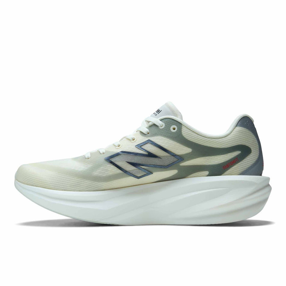 Medial view of the right shoe from a pair of New Balance Men's SC Rebel Running Shoes in the Angora/Slate Grey colourway.