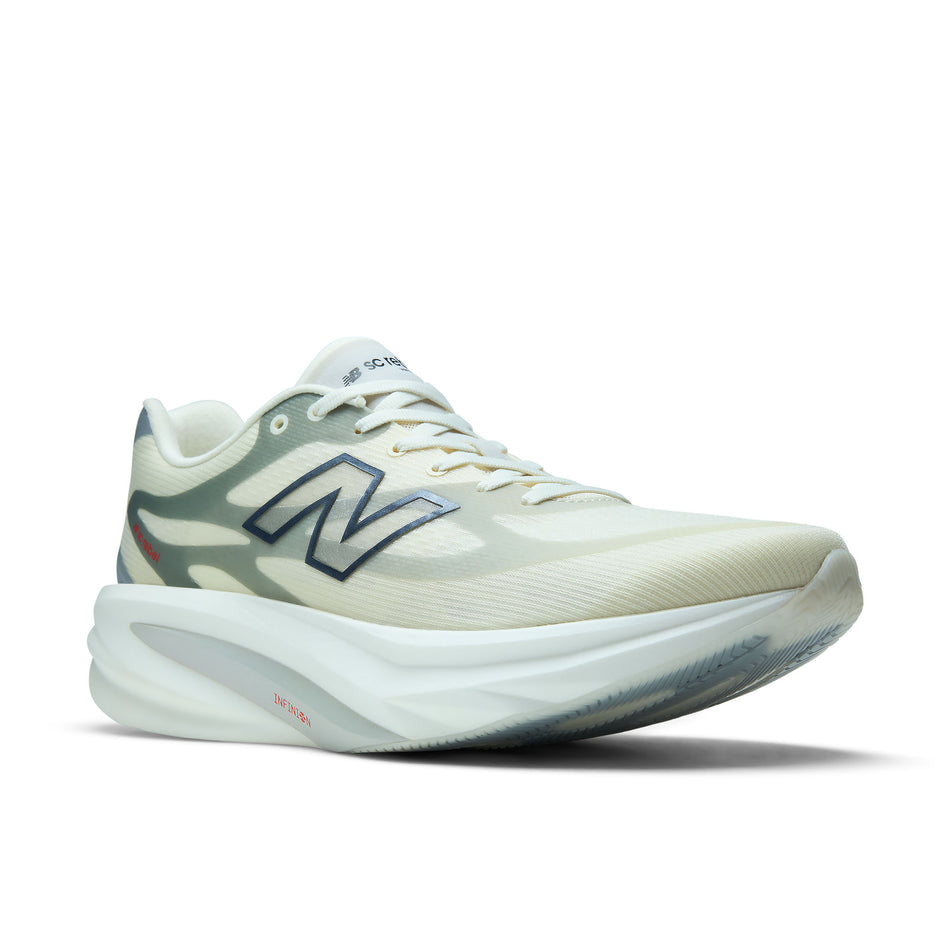 Lateral view of the right shoe from a pair of New Balance Men's SC Rebel Running Shoes in the Angora/Slate Grey colourway.