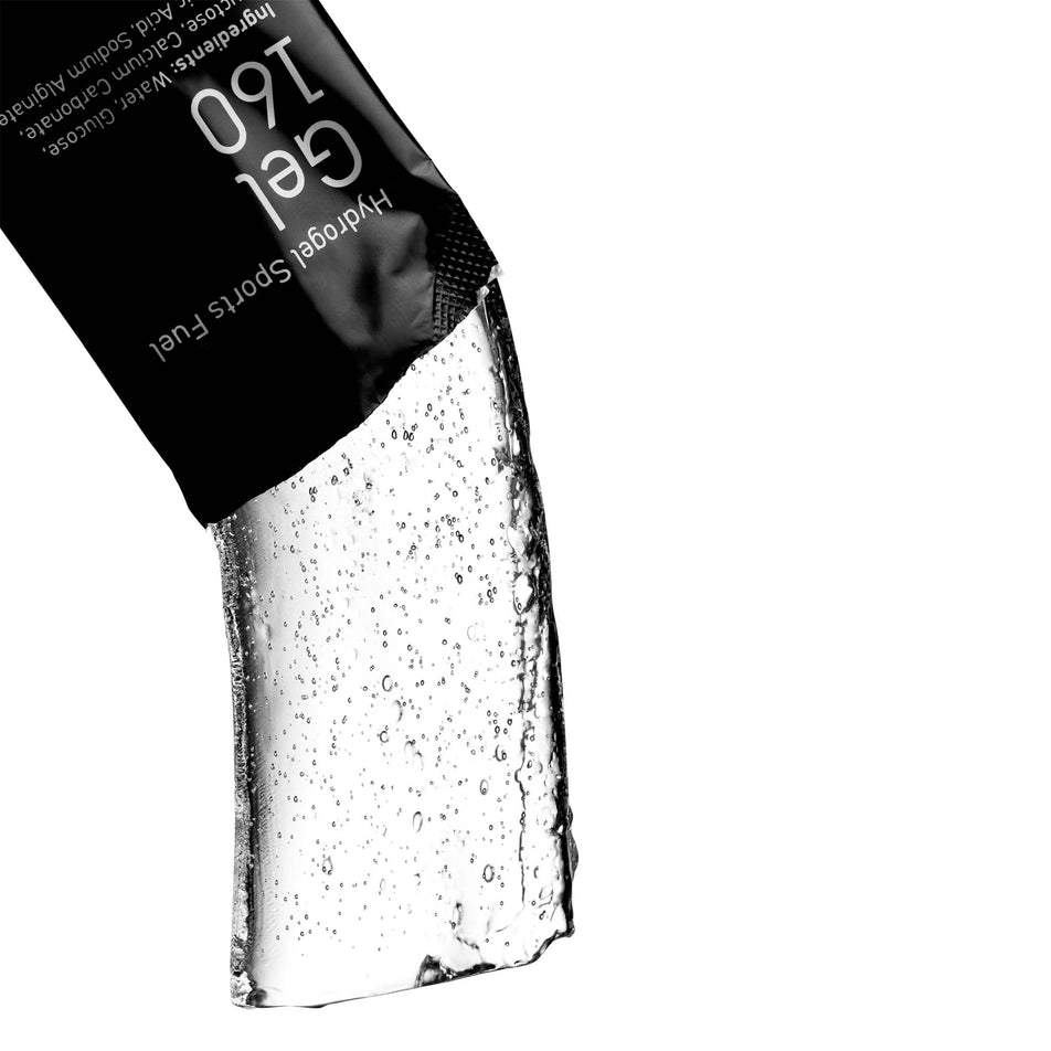 Gel pouring out of a sachet of Maurten Gel 160 (8042820370594)