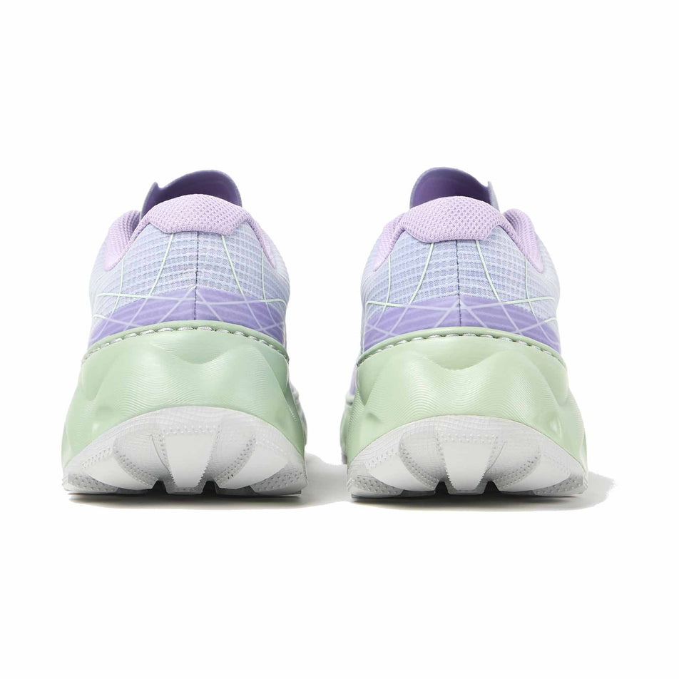 The back of a pair of NNormal Unisex Tomir 2.0 Running Shoes in the Green/Blue colourway. (8590339375266)