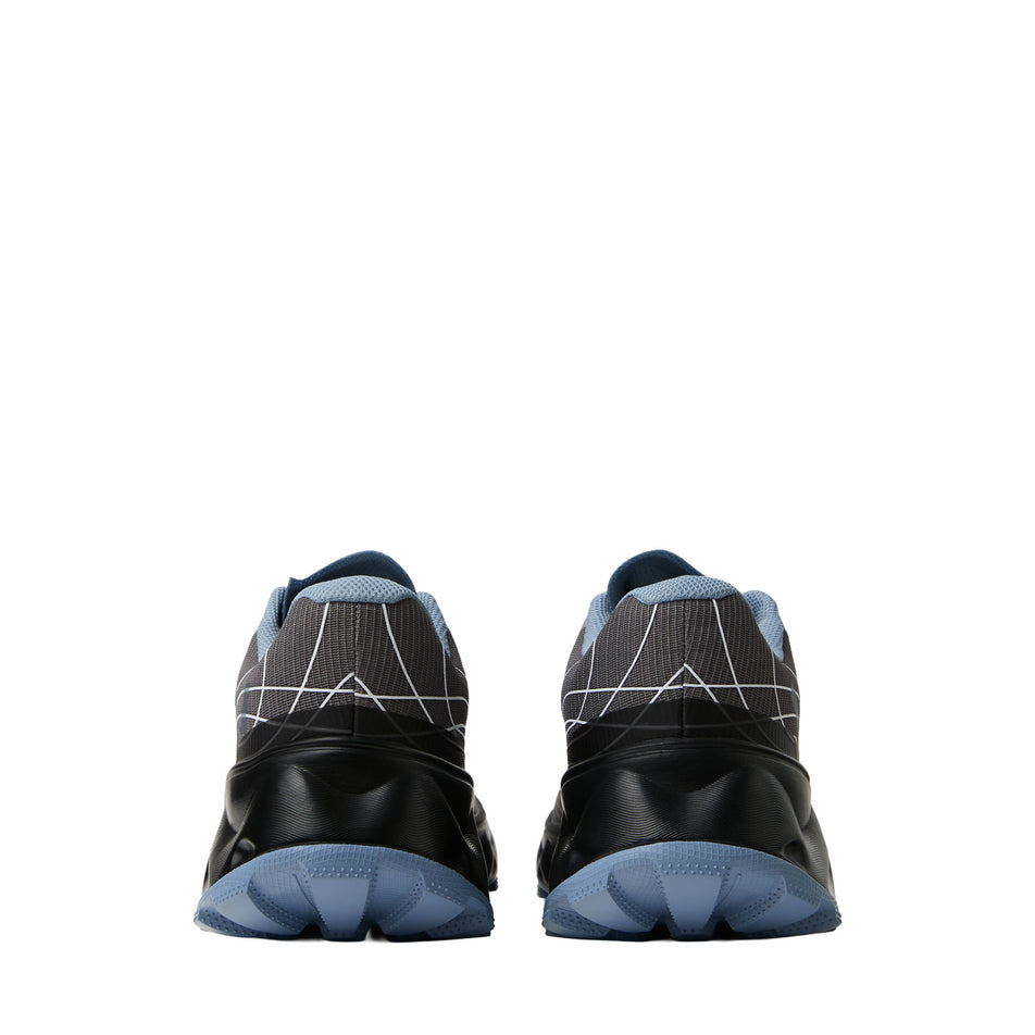 The back of a pair of NNormal Unisex Tomir 2.0 GTX Running Shoes in the Blue/Grey colourway.