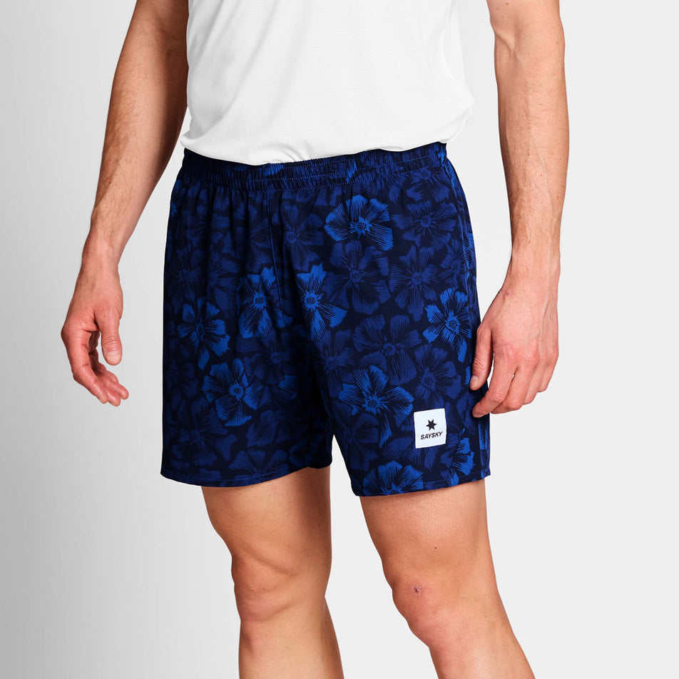 Front view of a model wearing a pair of SAYSKY Men's Flower Pace Shorts 5