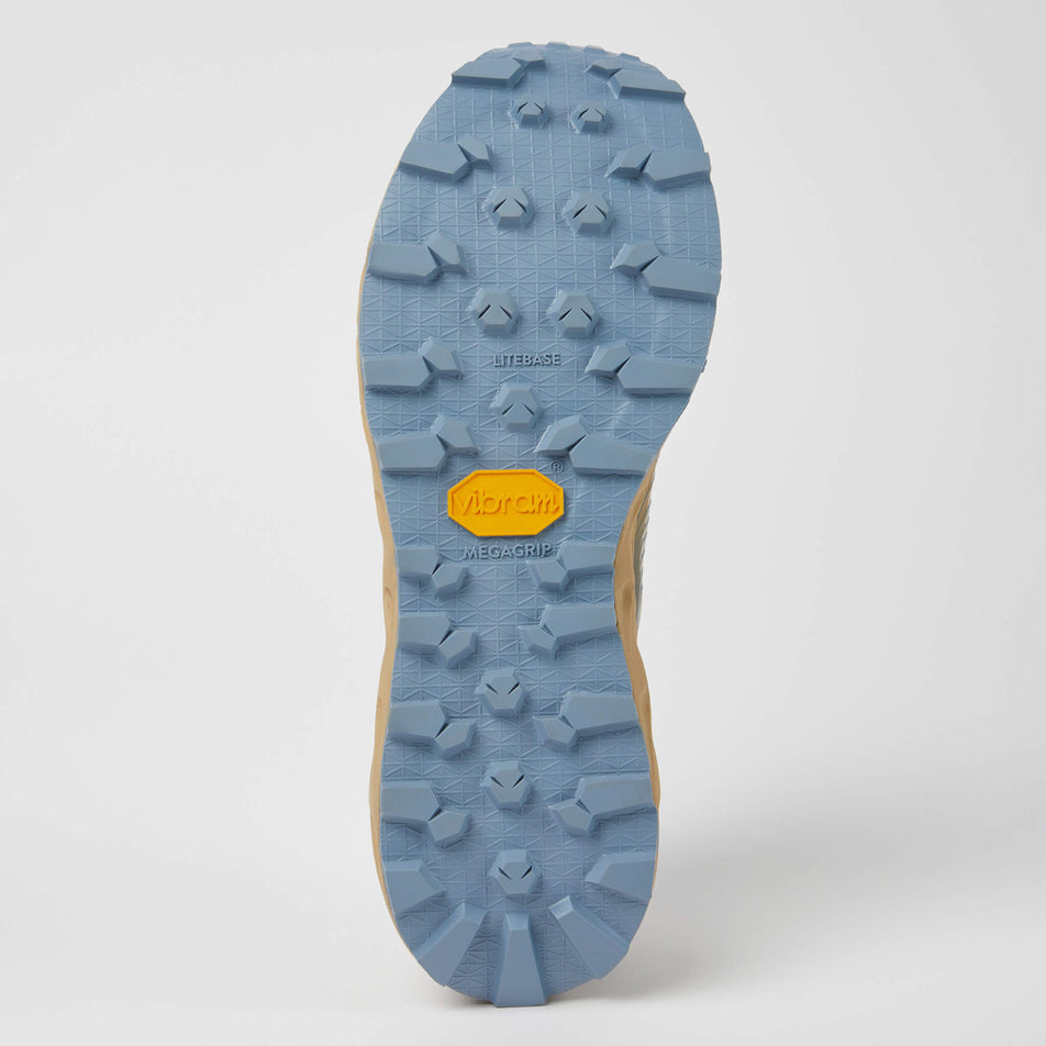 Outsole of the right shoe from a pair of NNormal Unisex Tomir Trail Running Shoes in the sand/blue colourway (7965429039266)