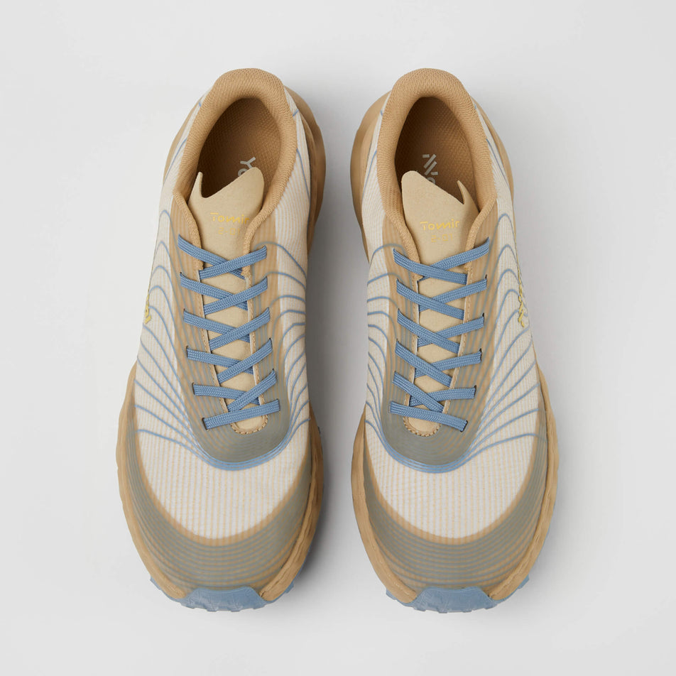 The uppers on a pair of NNormal Unisex Tomir Trail Running Shoes in the sand/blue colourway (7965429039266)