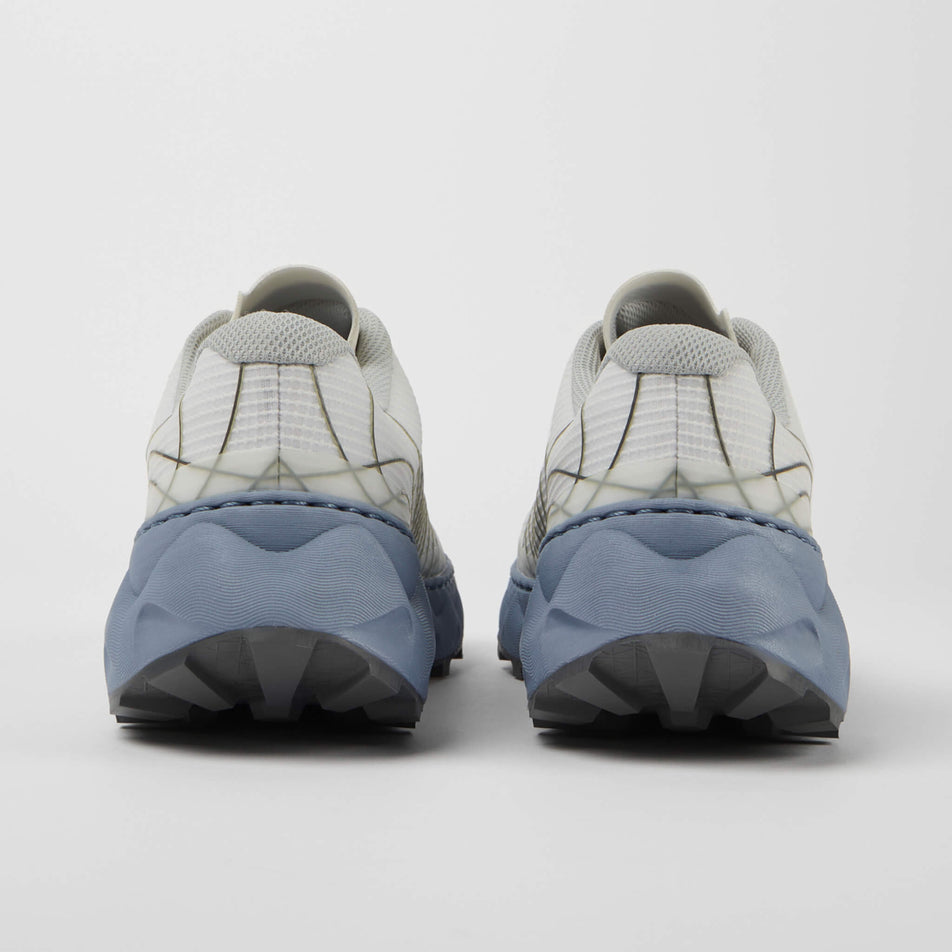 The back of a pair of NNormal Unisex Trail Running Shoes in the white/blue colourway (7965460988066)