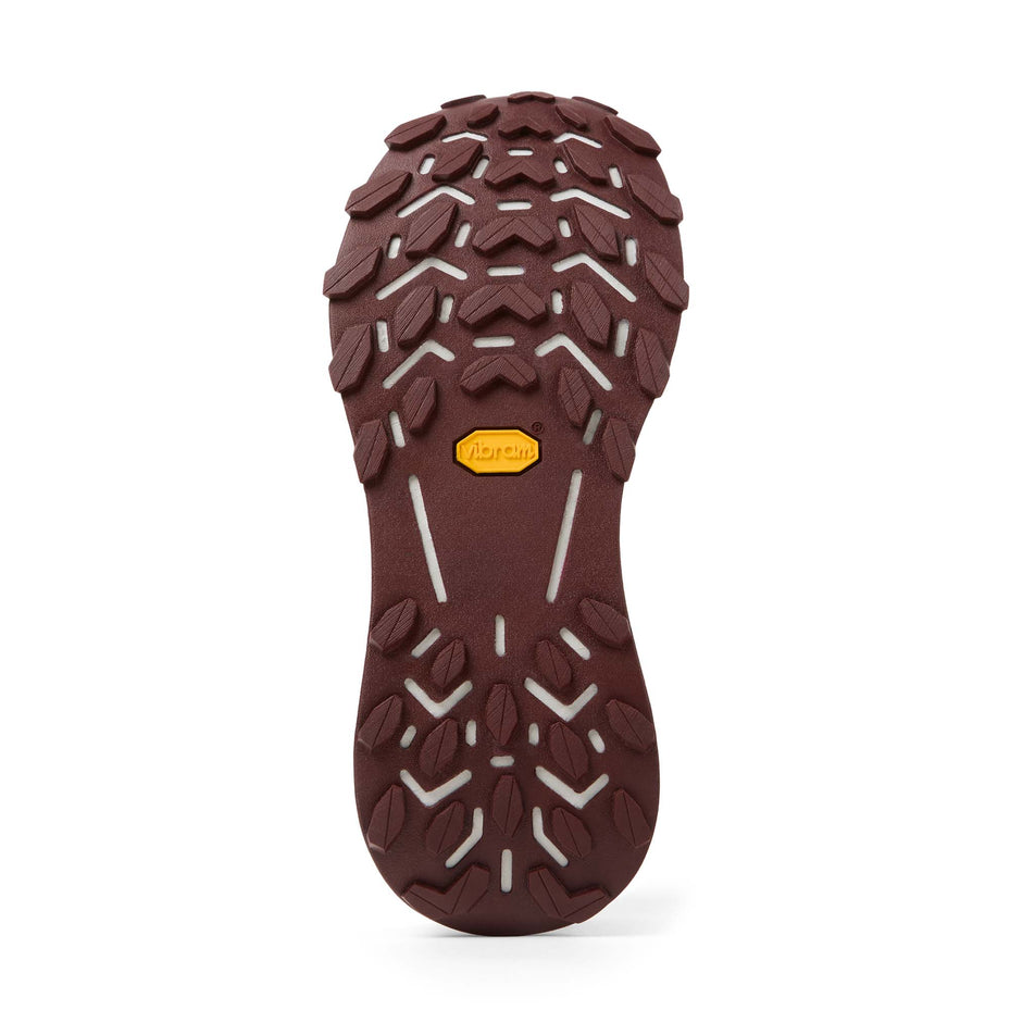 The outsole of the right shoe from a pair of NNormal Women's Cadí Running Shoes in the Green colourway.