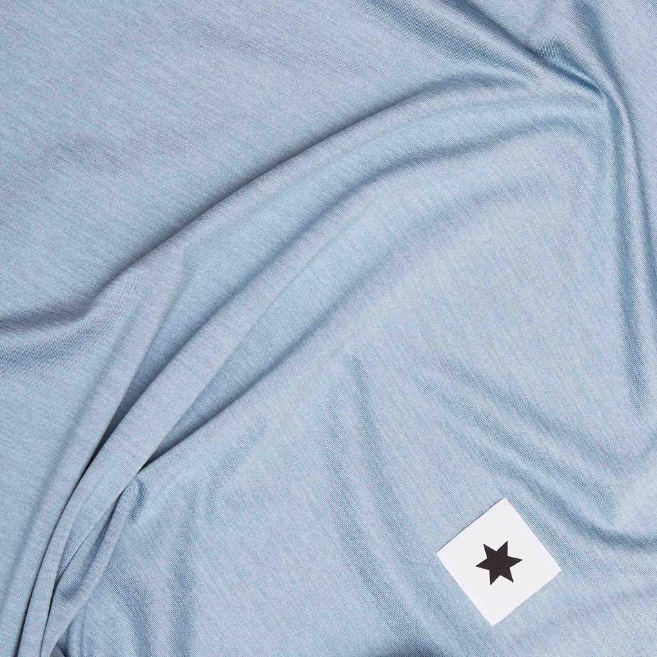 Close-up of the SAYSKY logo on the SAYSKY Women's Logo Pace Long Sleeve in the Blue Melange colourway. (8602010452130)