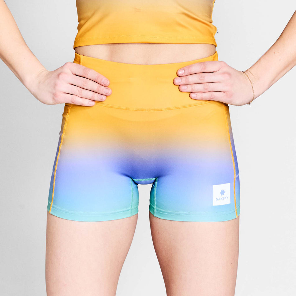 Front view of a model wearing the SAYSKY Women's Drip Dye Combat+ Short Tights 4