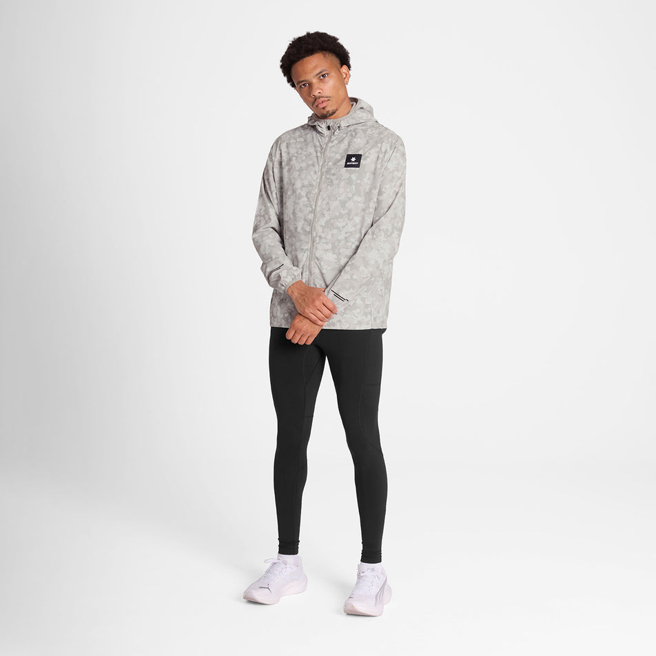 Front view of a model wearing the SAYSKY Men's Camo Pace Jacket in the White colourway. (8781019578530)