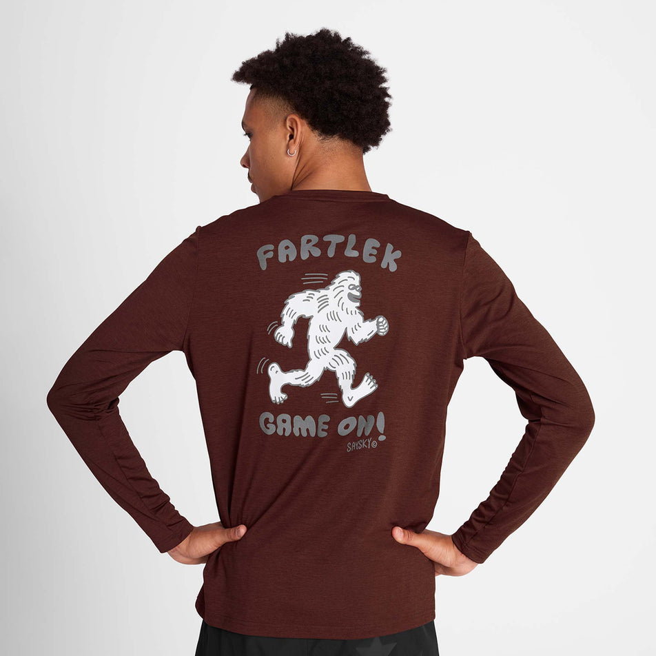 Back view of a model wearing the SAYSKY Men's Statement Pace Long Sleeve in the Red colourway. (8781022068898)