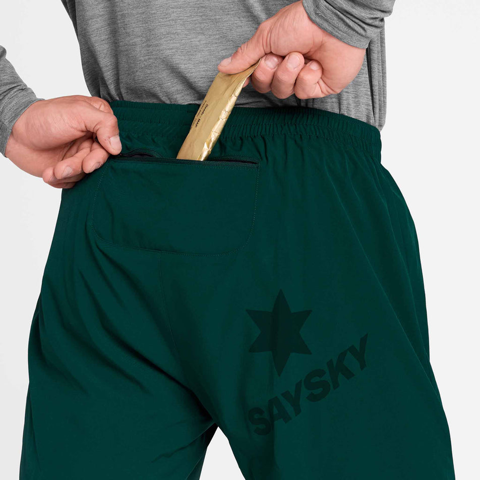 Close-up view of the zip pocket on the back of the SAYSKY Men's Pace Shorts 5