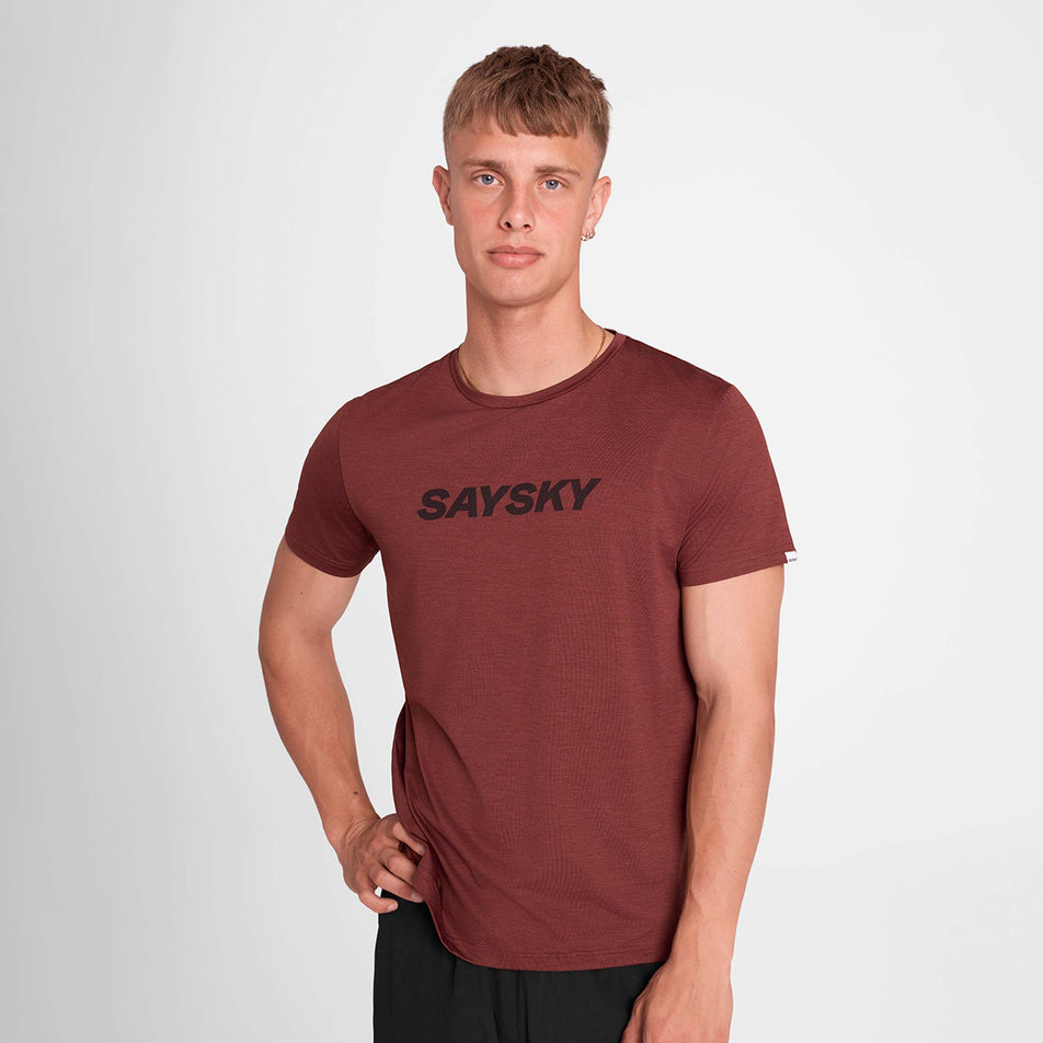 Front view of a model wearing the SAYSKY Men's Logo Pace T-Shirt in the Red colourway. (8731675394210)