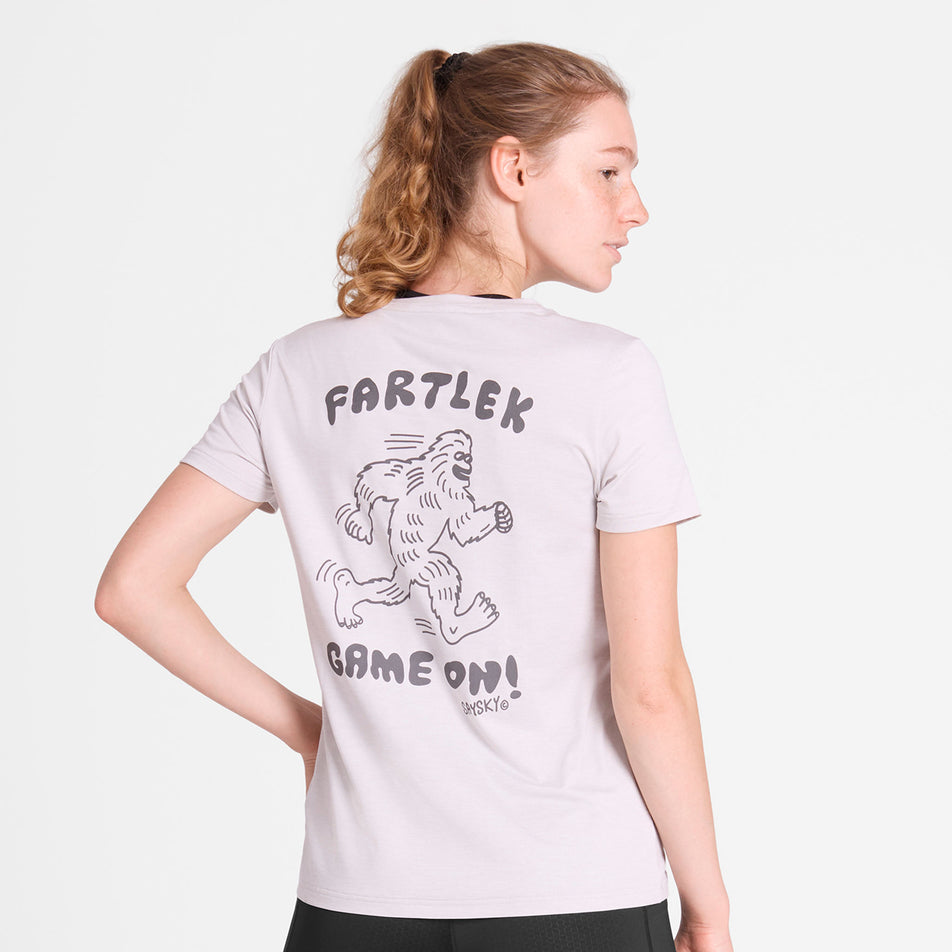 Back view of a model wearing the SAYSKY Women's Statement Pace T-Shirt in the White colourway. (8781026721954)