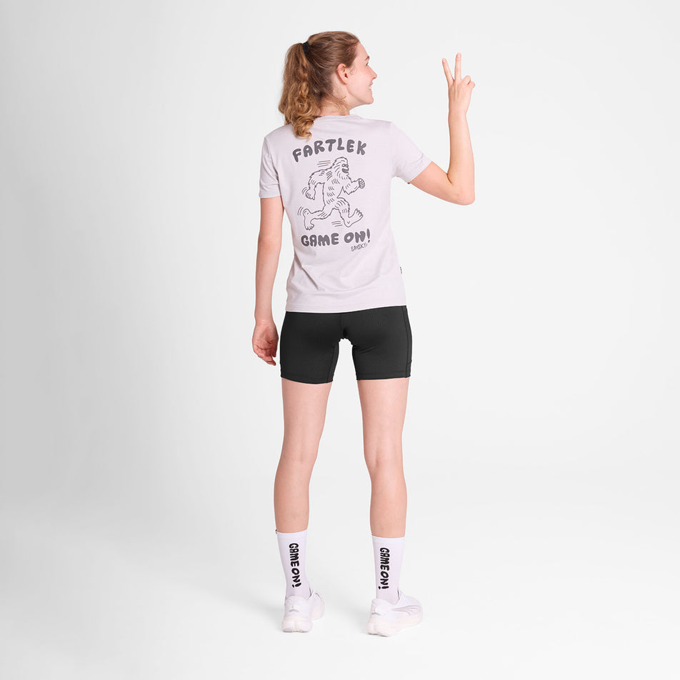 Back view of a model wearing the SAYSKY Women's Statement Pace T-Shirt in the White colourway. (8781026721954)