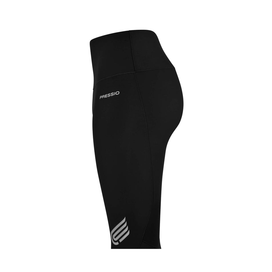 Side view of the Pressio Women's EQ Tight-High Rise in the Black colourway. Only the upper two-thirds of the tight can be seen in the image. (8475843494050)