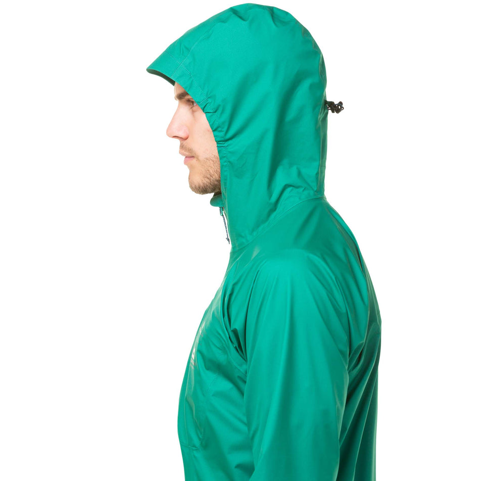 Left-side view of a model wearing a Ronhill Men's Tech GORE-TEX Mercurial Jacket with the hood up. Upper two-thirds of the jacket is in the image. (8048099786914)