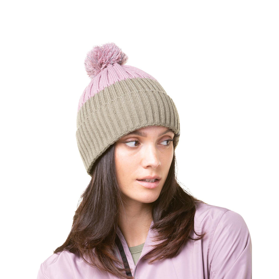 Front view of a model wearing a Ronhill Unisex Bobble Hat in the Woodland/Stardust colourway (8033745698978)