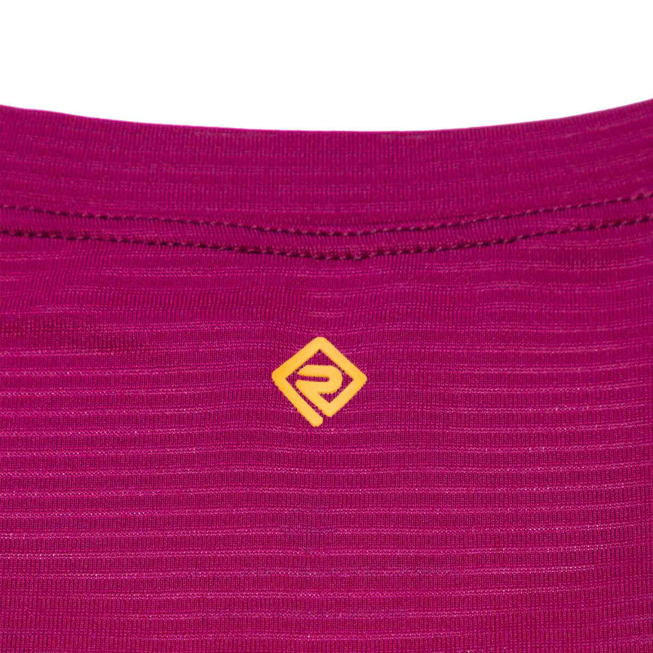 Close-up view of the Ronhill logo on the upper back of the Women's Tech S/S Tee. (8490111729826)