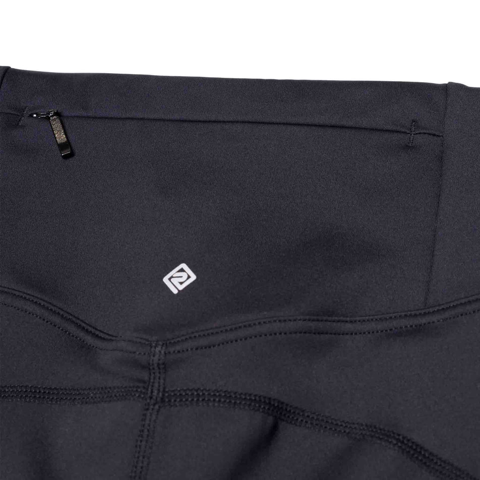 The zip pocket on the back of the Ronhill Women's Tech Stretch Short in the All Black colourway. (8583497482402)