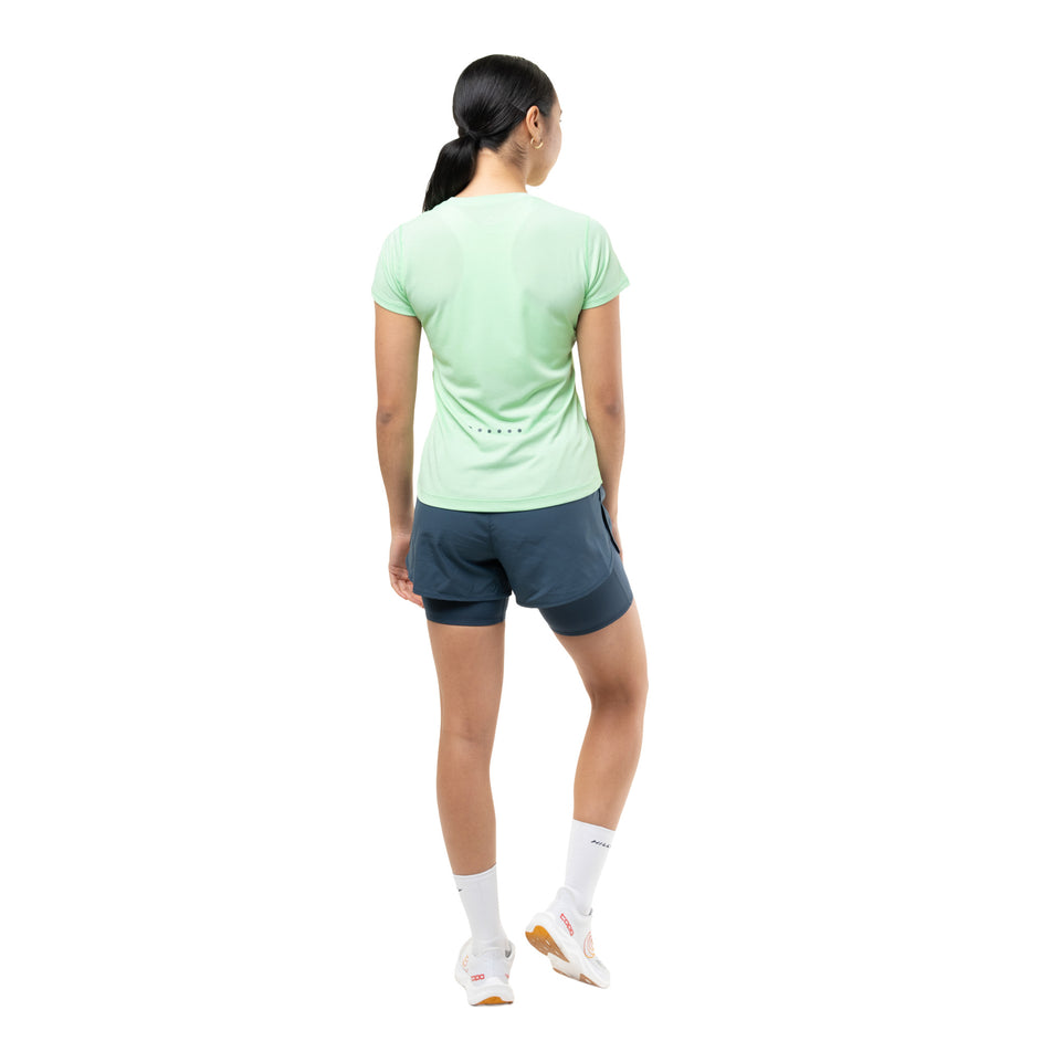 Back view of a model wearing the Ronhill Women's Core Twin Short in the Evening Haze colourway.