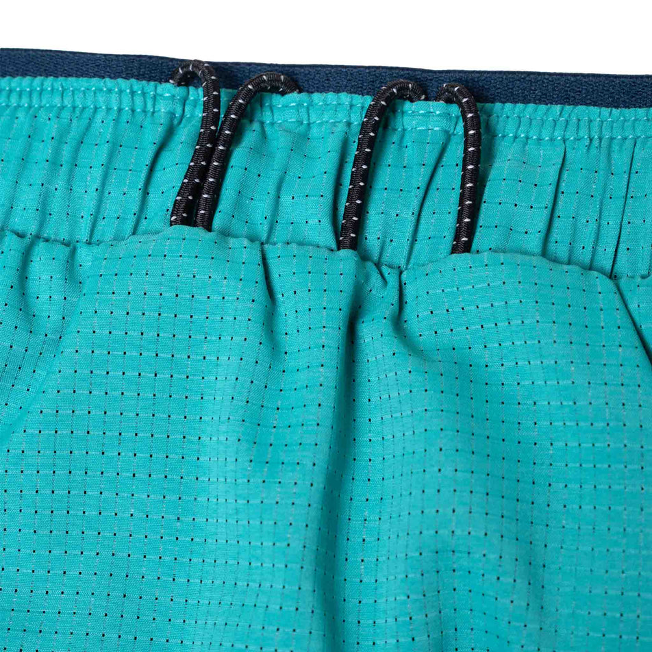 Close-up view of one of the gel loops on the Ronhill Men's Tech Race Short in the Deep Laguna/Seafaring colourway. (8563608027298)