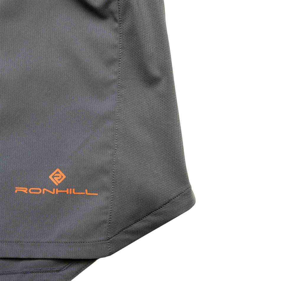 Close-up of the Ronhill logo and outer fabric on the Ronhill Men's Tech 5