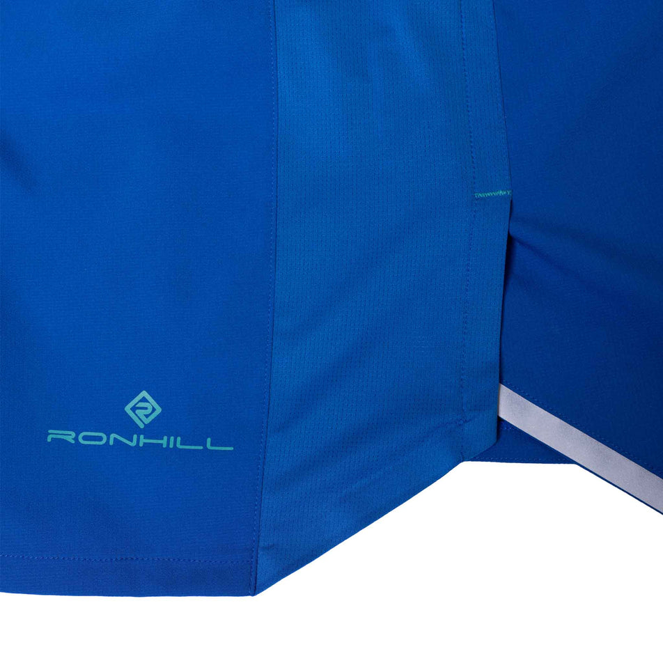 The Ronhill logo and reflective detail on the side of the Ronhill Men's Tech 5