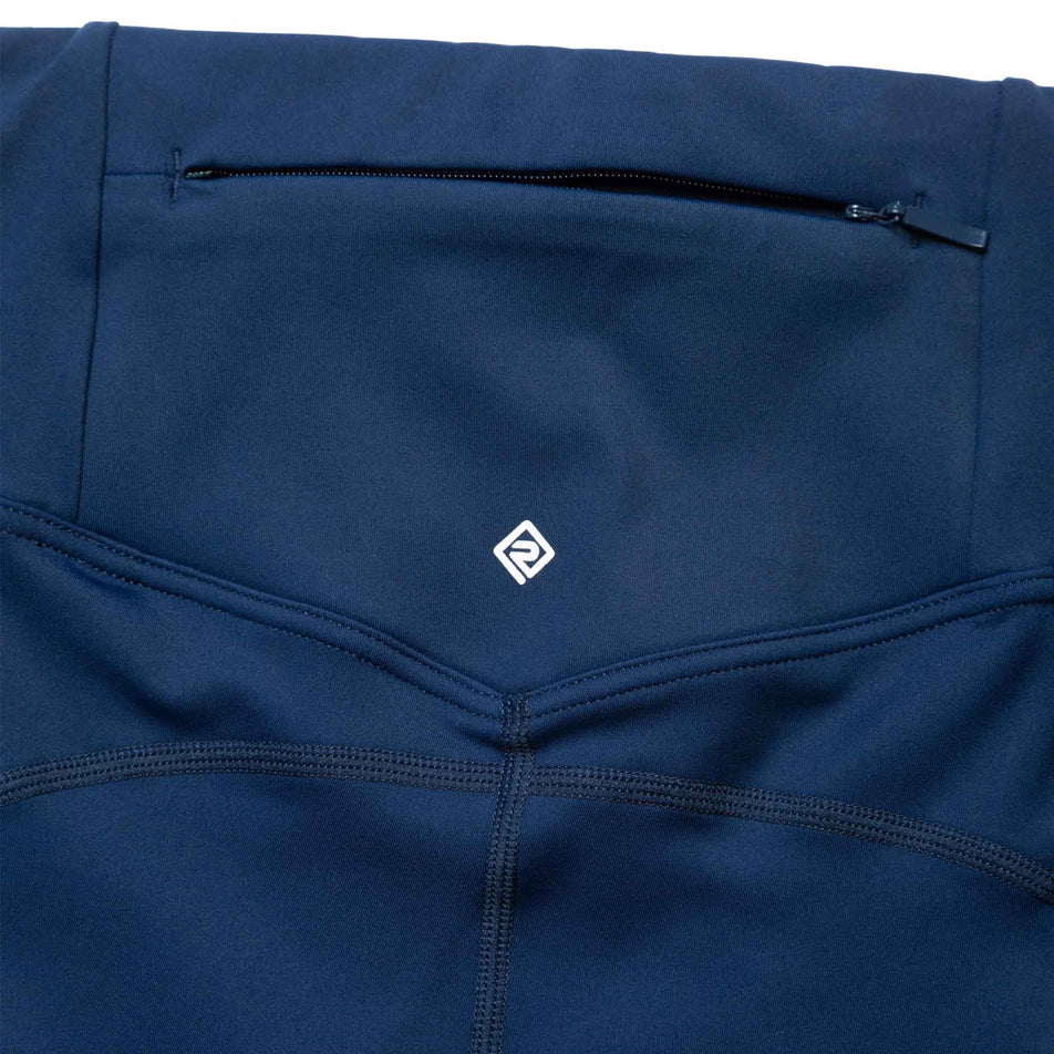 Close-up of the zipped back pocket on the Ronhill Women's Tech Tight in the Dark Navy colourway. (8469366079650)