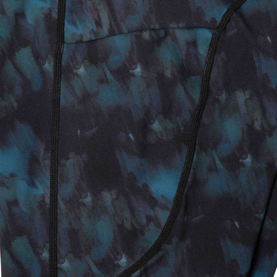 Close-up view of the drop-in stash pocket on the side of the Ronhill Women's Tech Tight in the Mallard Mist colourway. (8564972159138)