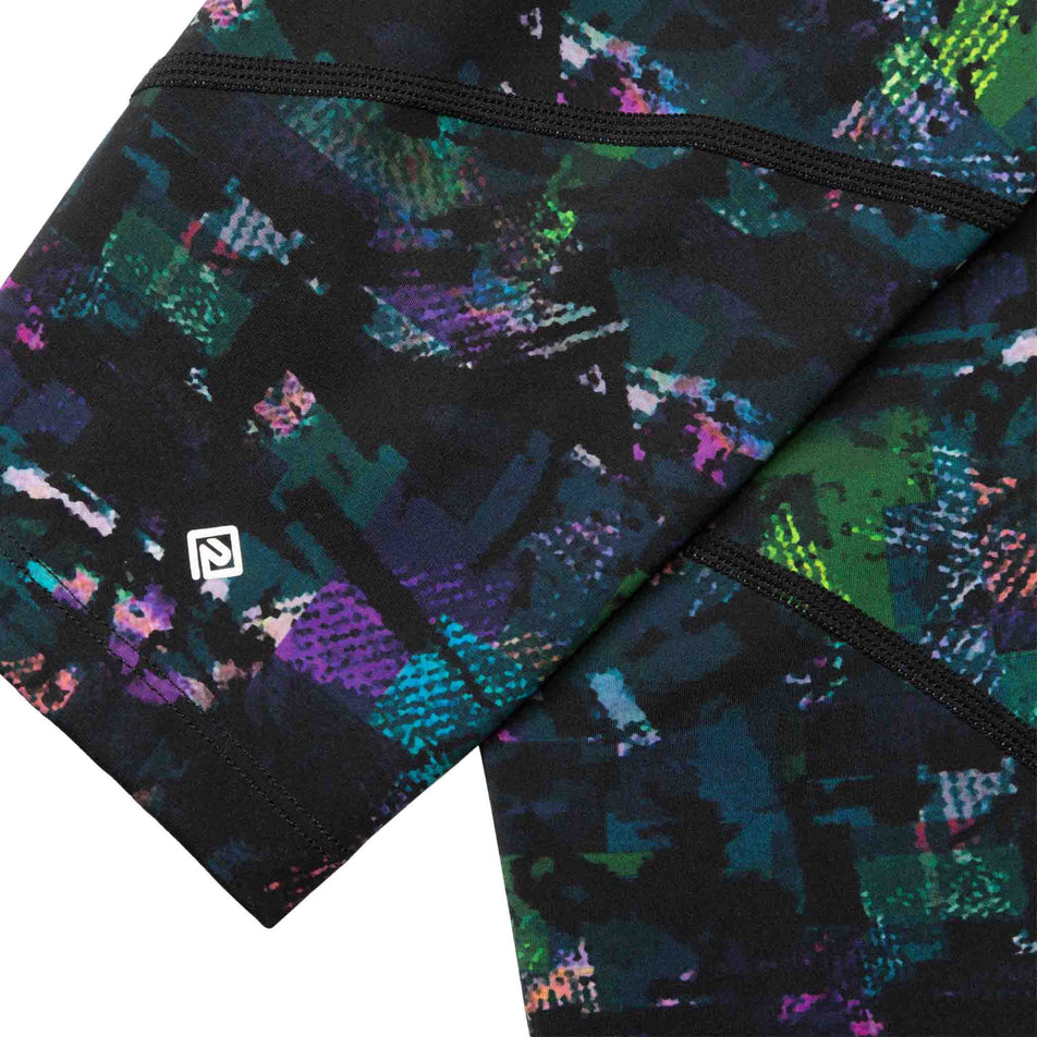 Close-up of the Ronhill logo and fabric on the lower leg of the Ronhill Women's Tech Crop Tight. (8490037543074)