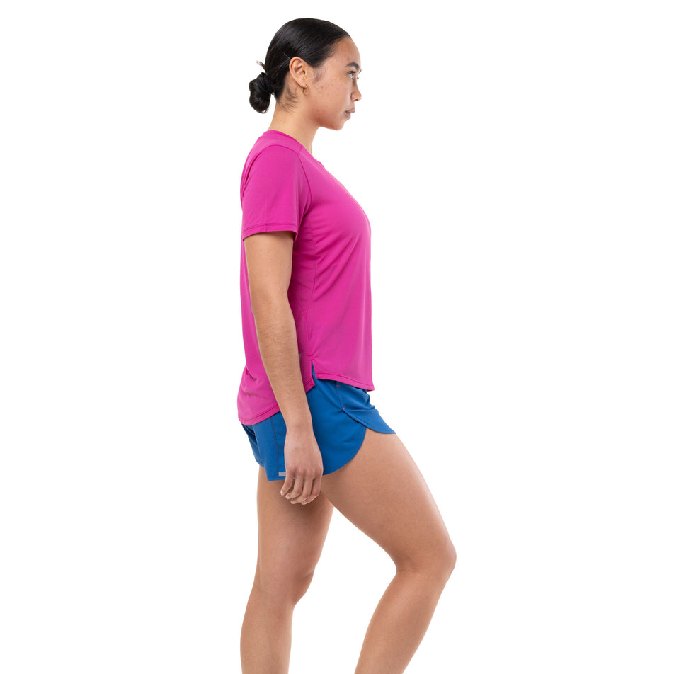 Side view of a model wearing the Ronhill Women's Tech 4.5