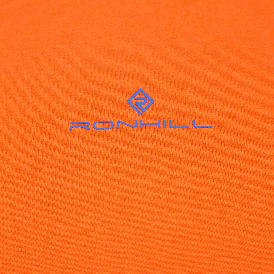 Close-up of the Ronhill logo on a Ronhill Men's Tech L/S Tee. (8490208952482)