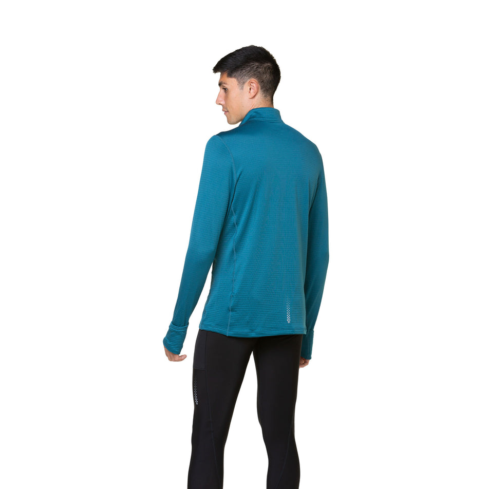 Back view of a model wearing a Ronhill Men's Tech Winter 1/2 Zip in the Deep Teal/Acid colourway. Model is also wearing leggings. (8490256990370)