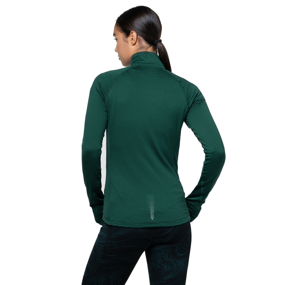 Back view of a model wearing the Ronhill Women's Tech Winter 1/2 Zip in the Seaweed/Iris colourway. (8747564925090)