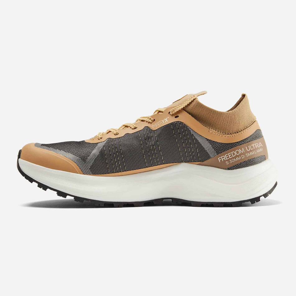 Medial side of the right shoe from a pair of Ronhill Women's Freedom Ultra Running Shoes in the Sand colourway. (8601106776226)