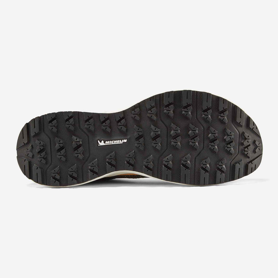 The outsole of the right shoe from a pair of Ronhill Women's Freedom Ultra Running Shoes in the Sand colourway. (8601106776226)