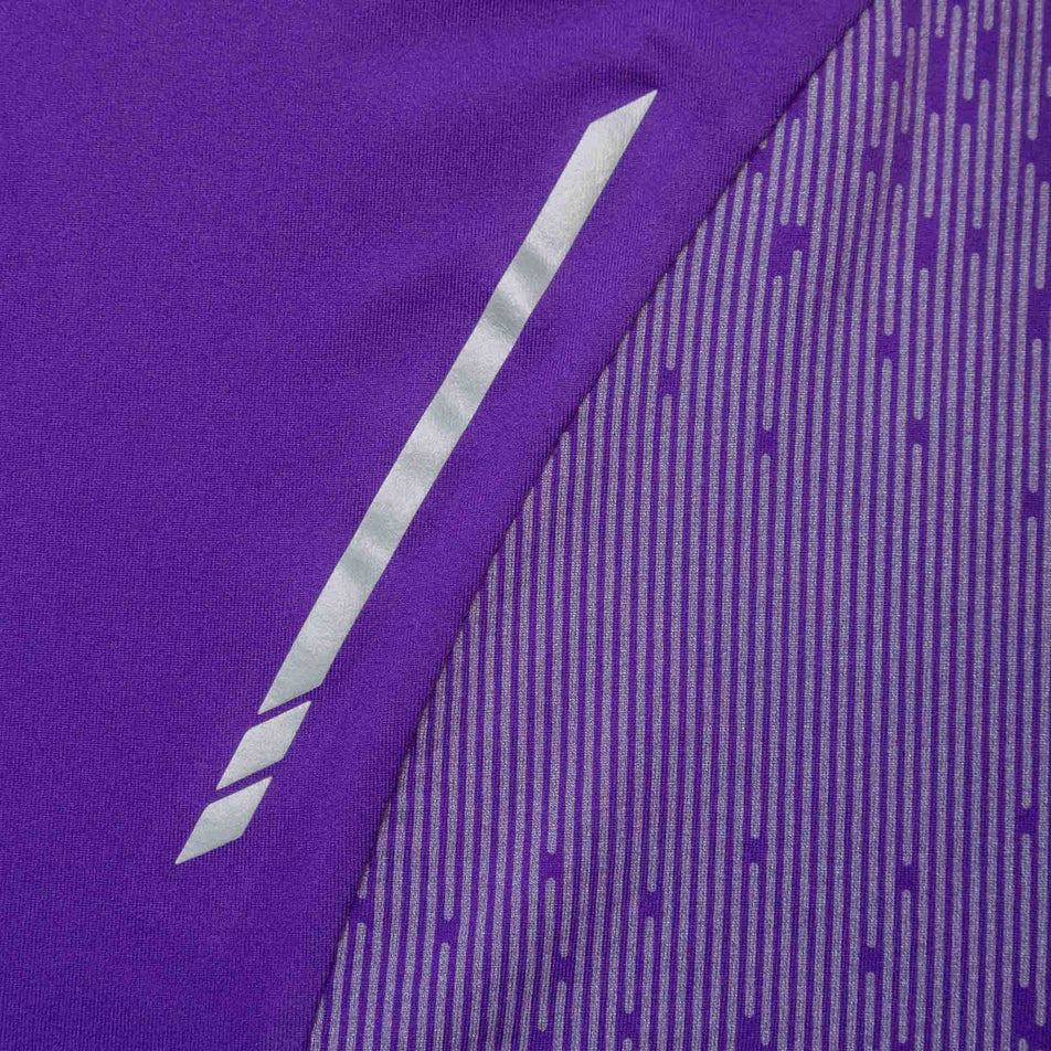 Close-up view of the fabric on a Ronhill Women's Tech Reflect 1/2 Zip in the Regal Purple/Reflect colourway. (8489687449762)