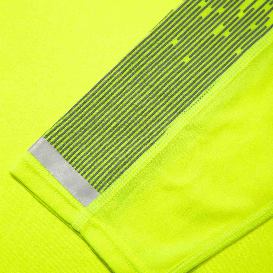 Close-up view of the fabric on a Ronhill Women's Tech Reflect L/S Tee in the Fluo Yellow/Reflect colourway. (8489706717346)
