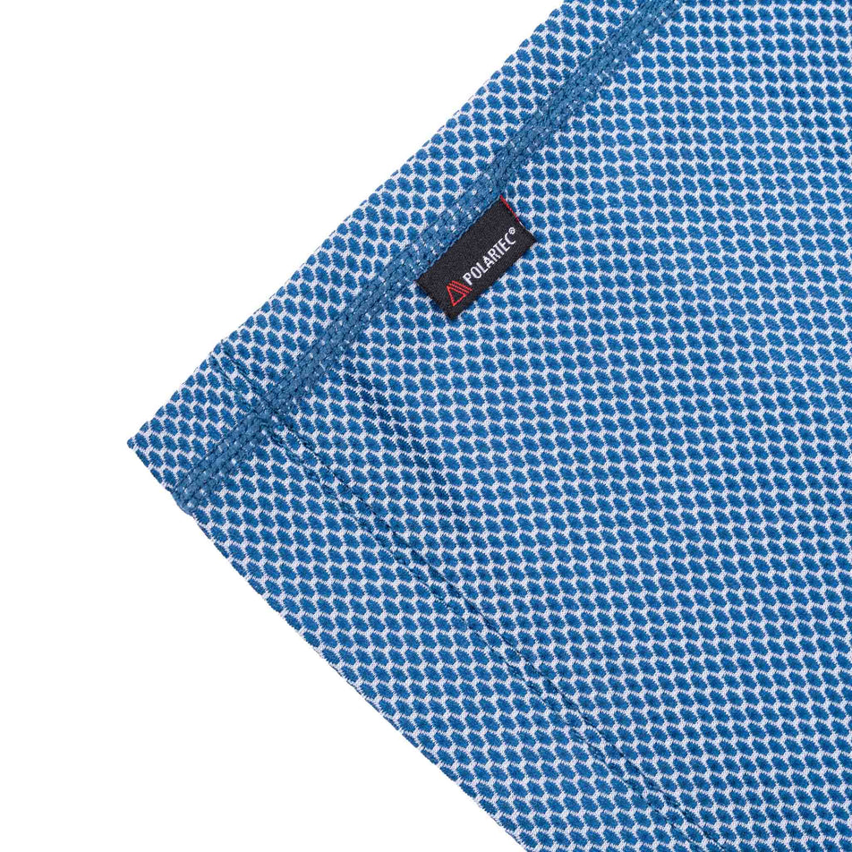 Close-up view of the Polartech label on the Ronhill Men's Tech Golden Hour L/S Tee in the Glacier Merge colourway.