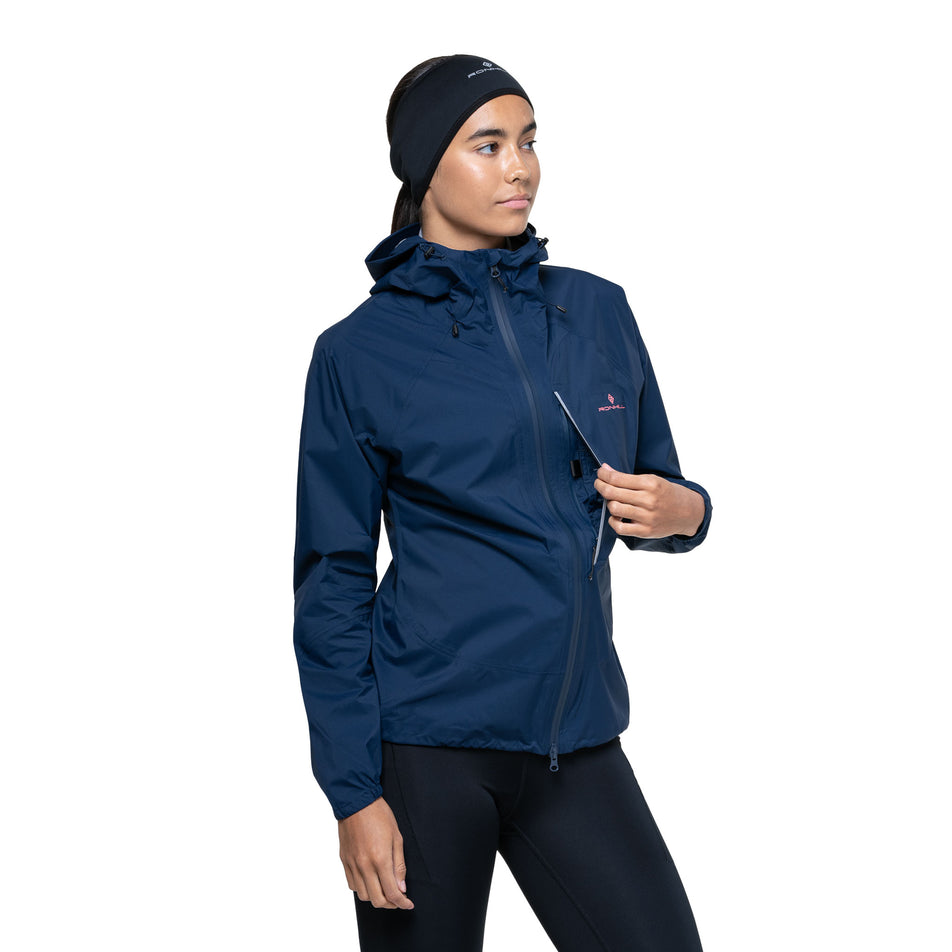 The chest pocket on the front of the Ronhill Women's Tech Storm Jacket in the Dark Navy colourway. (8742197559458)