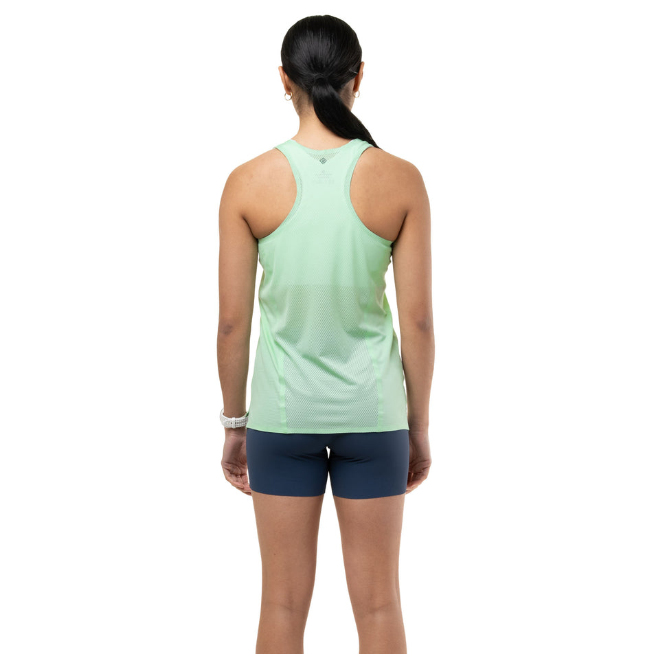 Back view of a model wearing the Ronhill Women's Tech Race Stretch Short in the Evening Haze colourway.