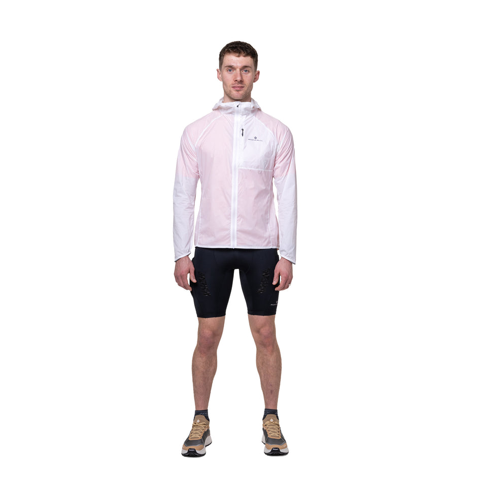 Front view of a model wearing the Ronhill Men's Tech All-Terrain Jacket in the Bright White colourway.