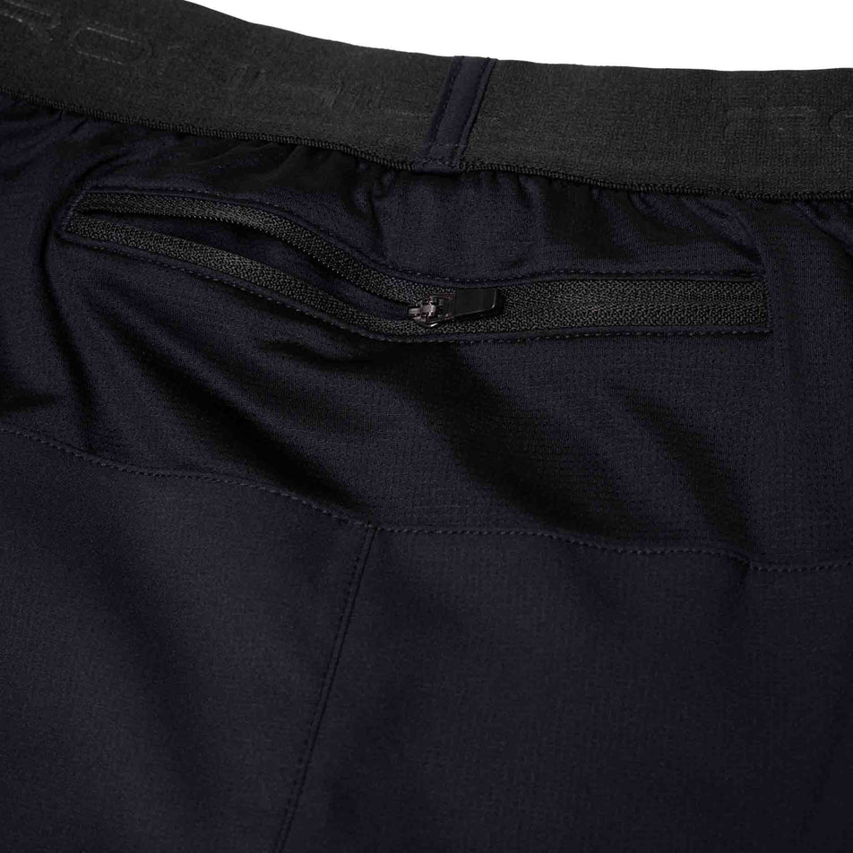 Close-up view of the zip pocket on the back of the Ronhill Men's Tech 7
