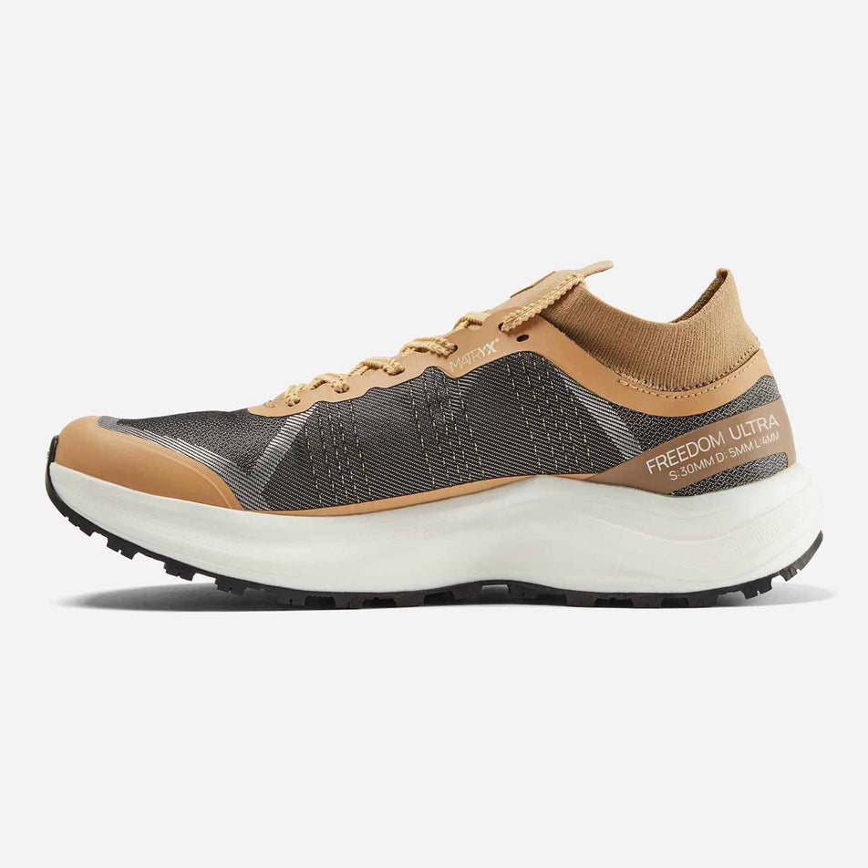Medial side of the right shoe from a pair of Ronhill Men's Freedom Ultra Running Shoes in the Sand colourway. (8601908314274)