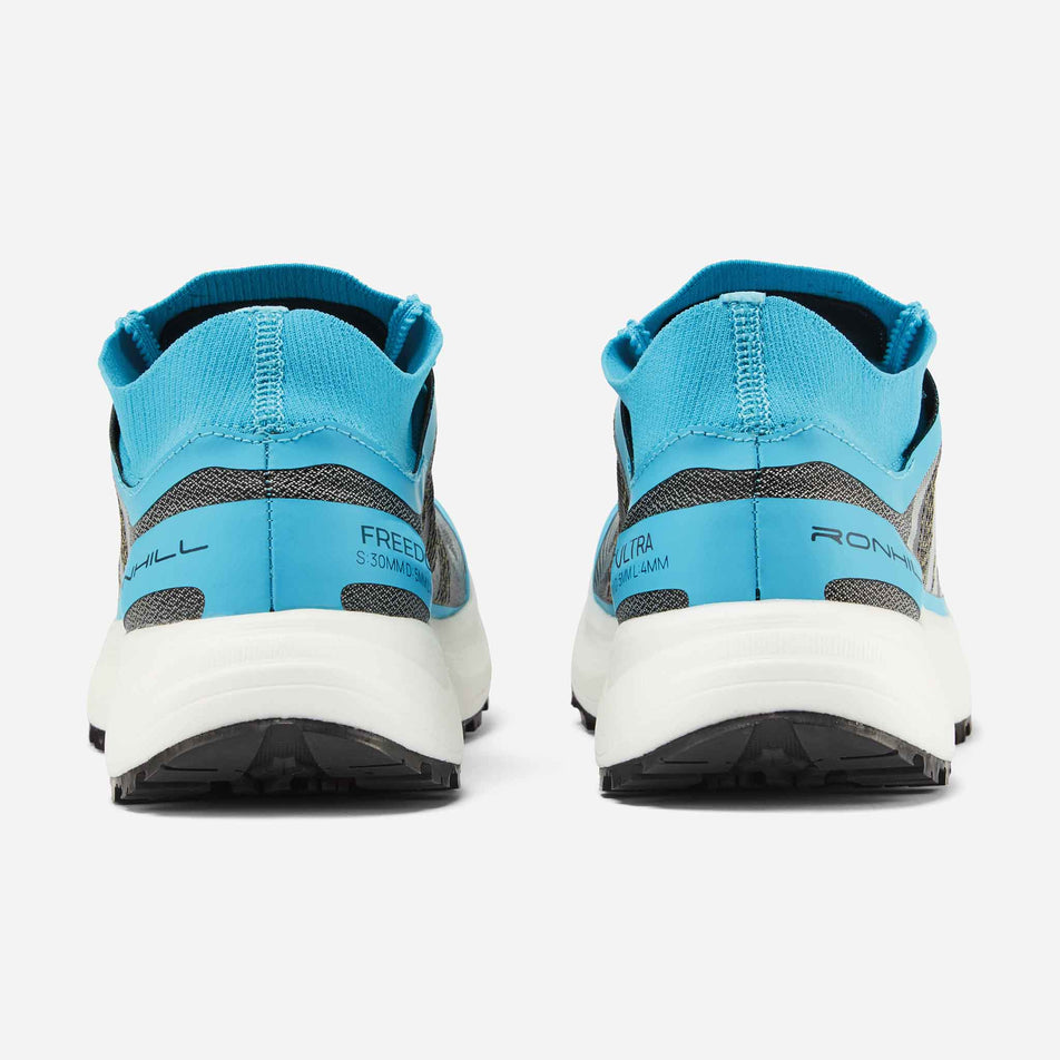 The back of a pair of Ronhill Men's Freedom Ultra Running Shoes in the Blue Atoll colourway.