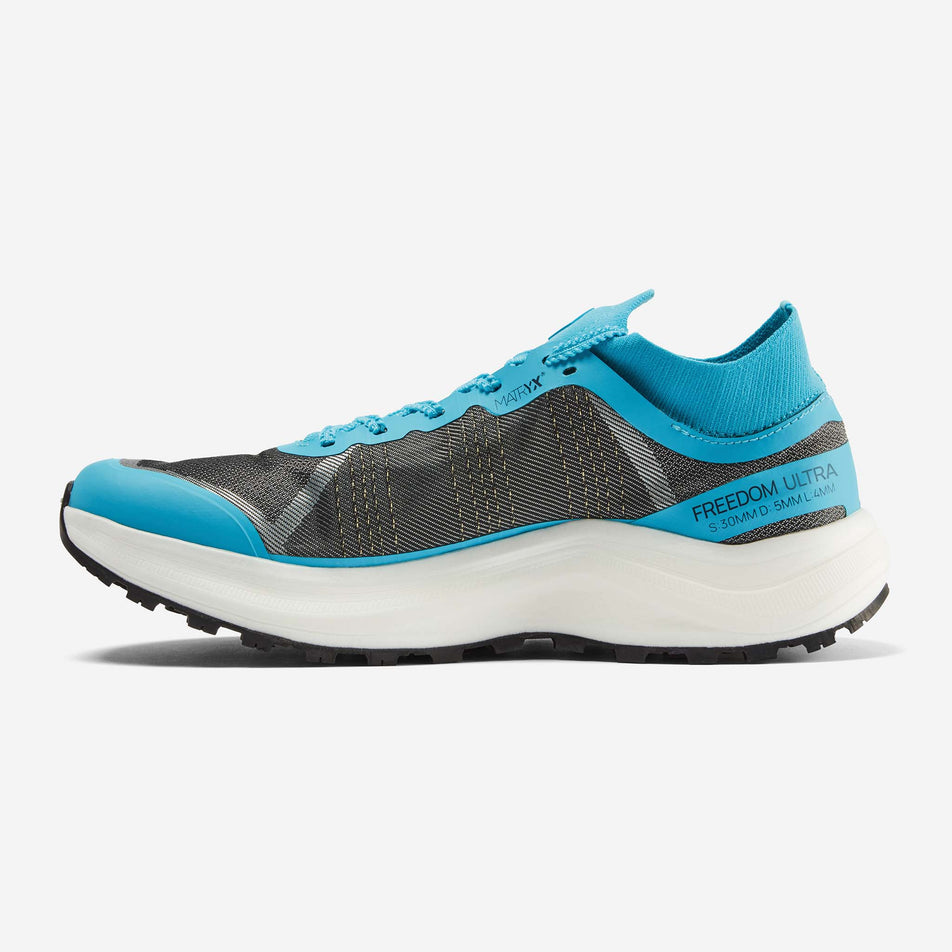 Medial view of the right shoe from a pair of Ronhill Men's Freedom Ultra Running Shoes in the Blue Atoll colourway.