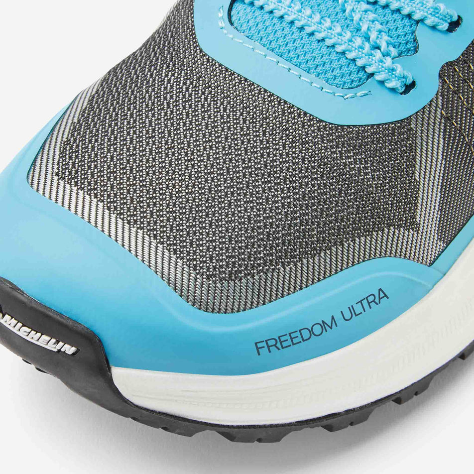 The toe box of the left shoe from a pair of Ronhill Men's Freedom Ultra Running Shoes in the Blue Atoll colourway.