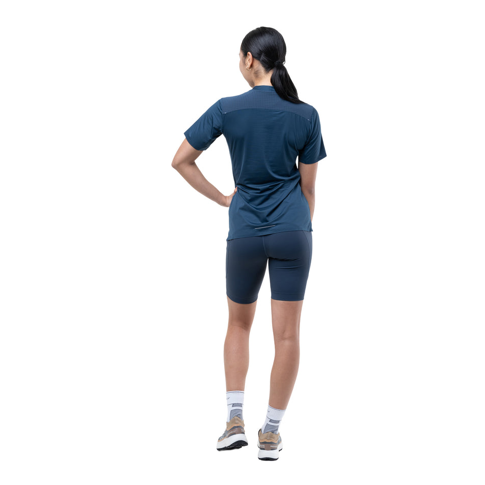 Back view of a model wearing the Ronhill Women's Tech All-Terrain S/S Tee in the Evening Haze colourway.