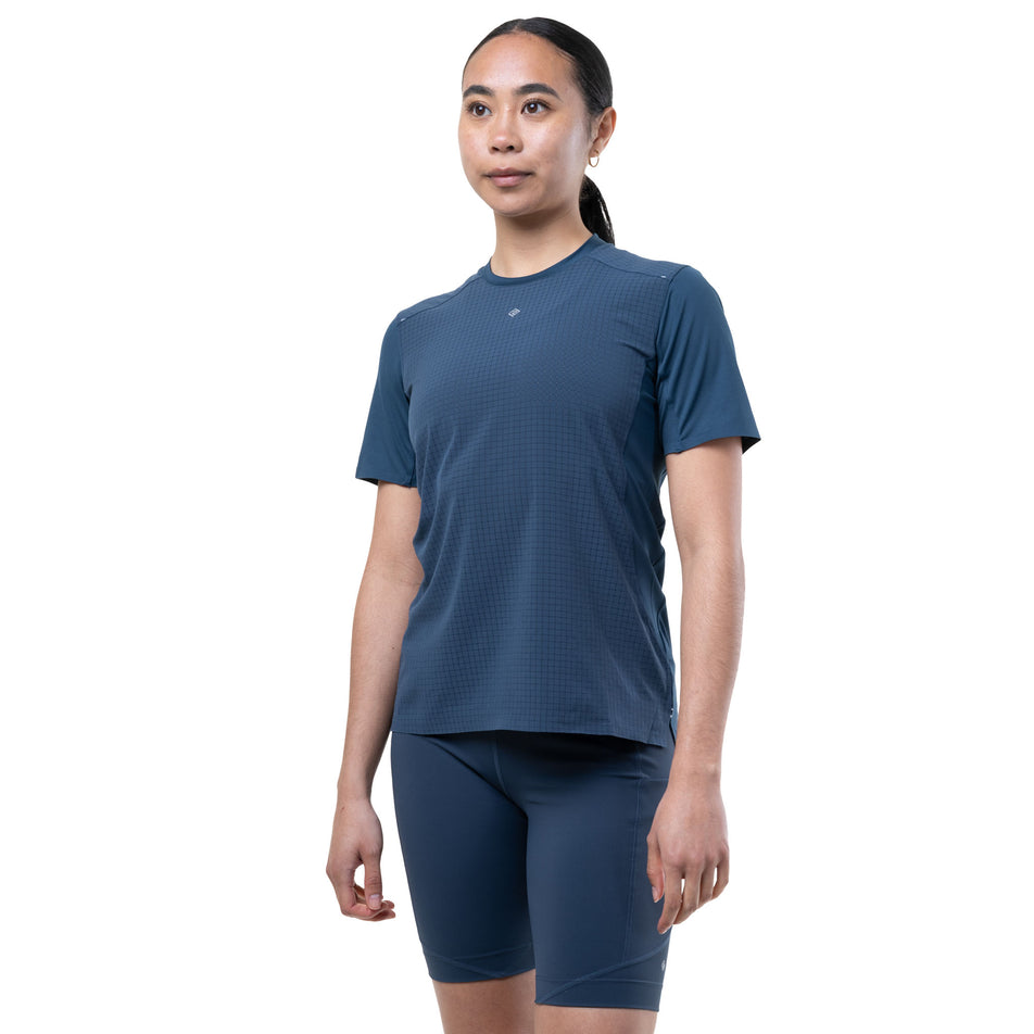 Front view of a model wearing the Ronhill Women's Tech All-Terrain S/S Tee in the Evening Haze colourway.