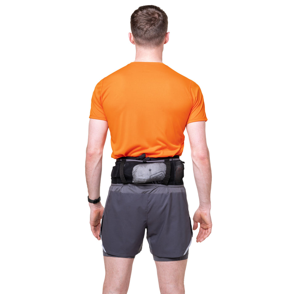 Back view of a model wearing the Ronhill Unisex Speed 360 in the Black/Ronhill Red colourway.